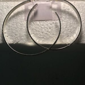 Jordache hoop pierced earrings.